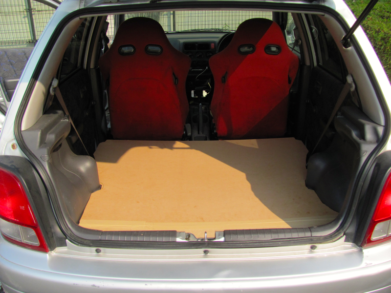 Illustration for article titled I Doubled My Hatchback Space With A False Floor And Here's How You Can Too